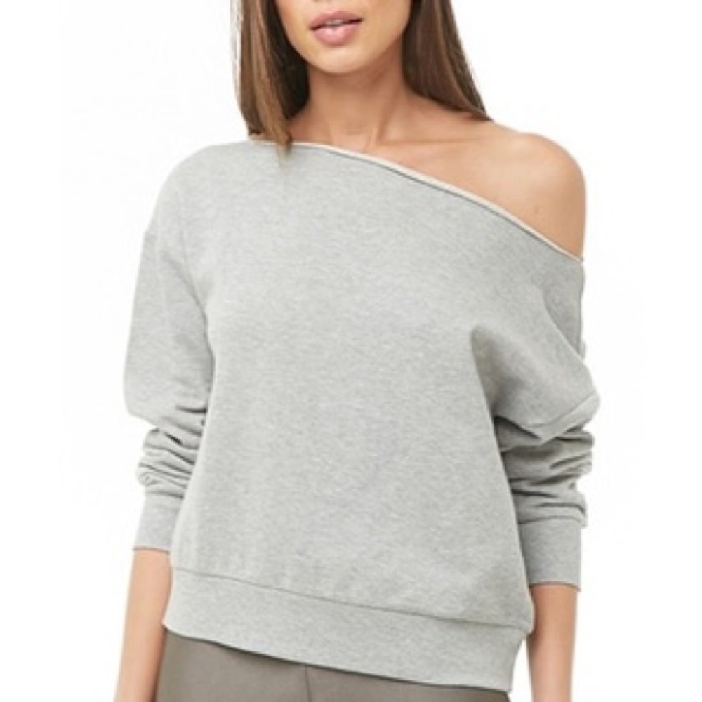 A gray off the shoulder sweatshirt.
